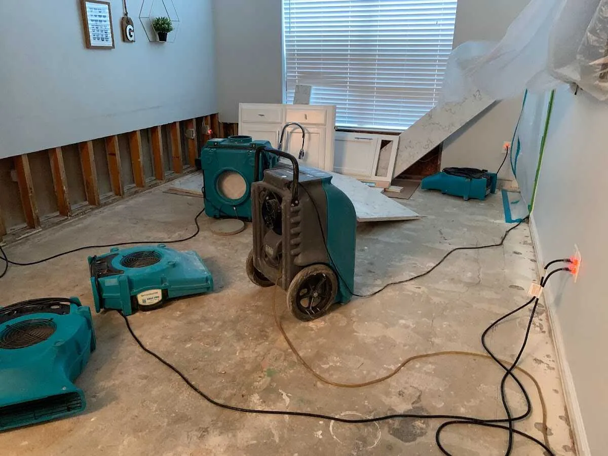 Dehumidifier in flood-cut room for Water Damage Restoration in Almena